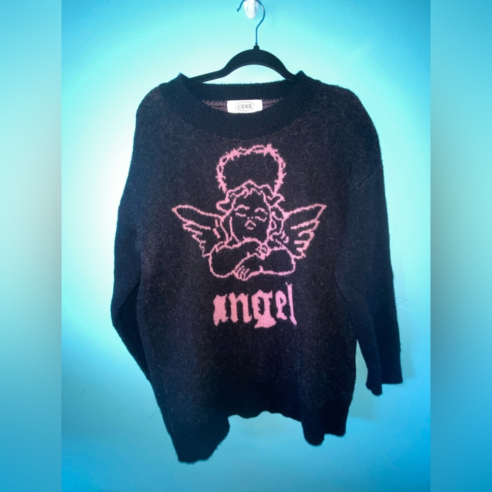 Oversized black angel sweater from Cider